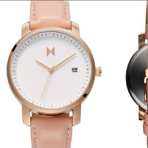 MVMT rose gold watch. See photos for details